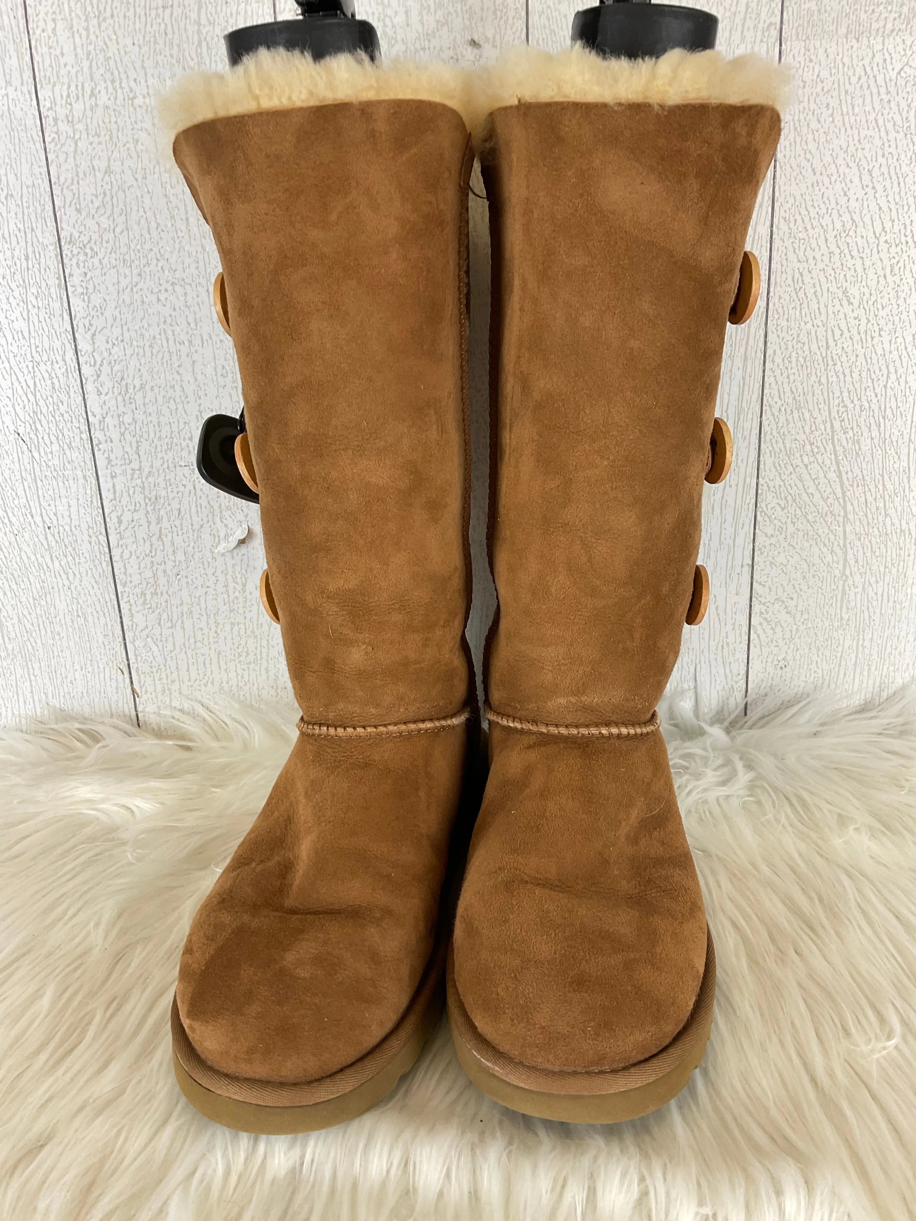 Boots Designer By Ugg In Brown, Size: 9